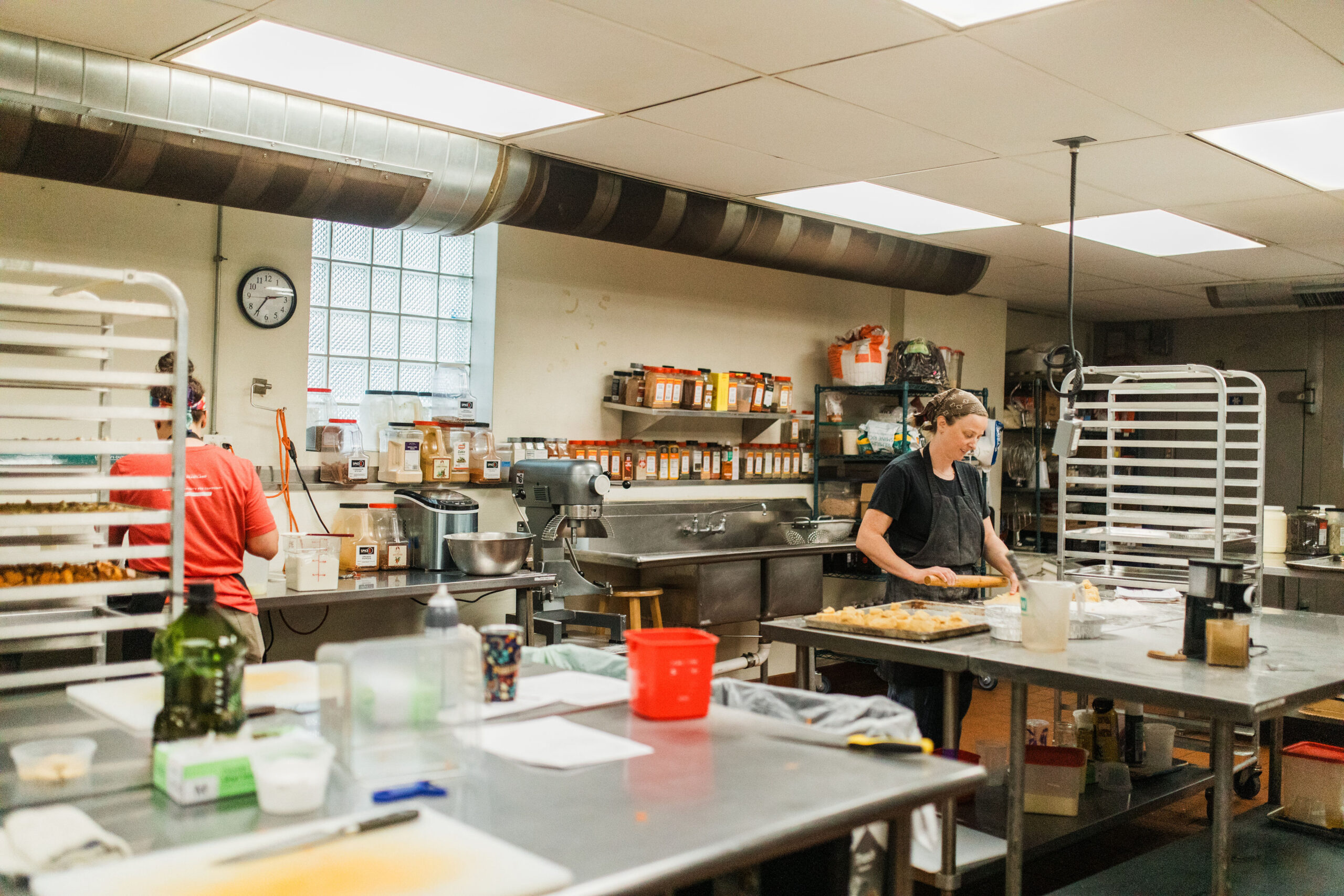 Small businesses and chefs working in the shared kitchen. Photo by Lee Vue.